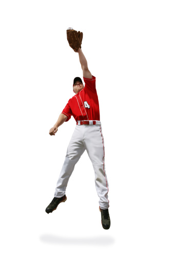 Baseball player making a fantastic leaping catch.
