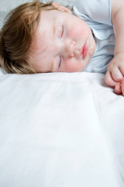 istock Baby sleeping, childhood, sleep or parenting background 157478547