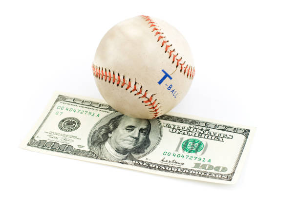 istock Baseball ball and dollar money 157478662