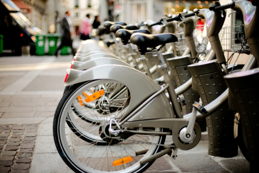 Paris bikes, parked on a central street