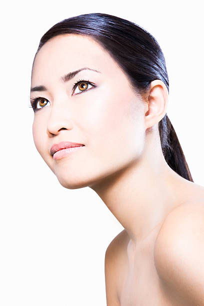 Profile photo of a naturally beautiful Asian woman stock photo