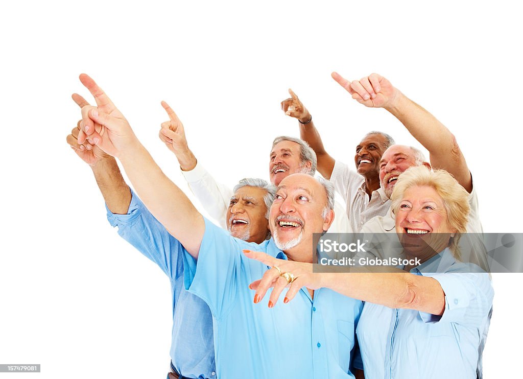 Felizes homens idosos e mulher a apontar para cima - Royalty-free 60-69 Anos Foto de stock