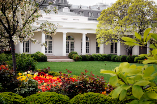 The West Wing of the White House, the office of President Barack Obama in spring time, entrance towards the White House garden. Exclusive and close view to the White House.