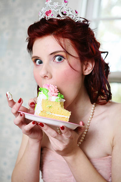 Sweet 16 girl eating cake