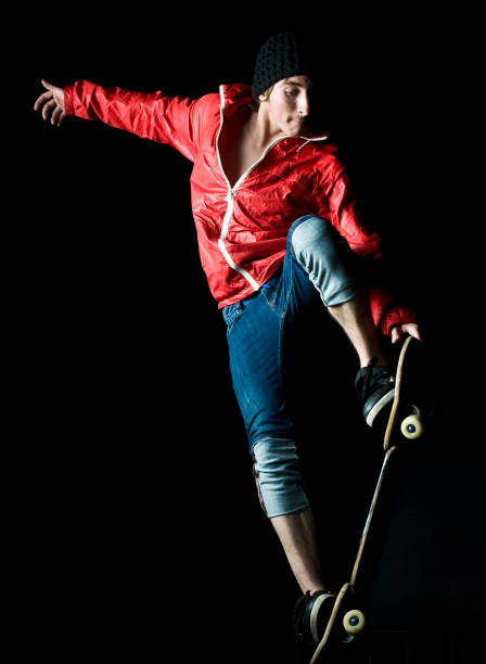 istock Young Man on a Skateboard Making Acrobatic Jump 157479178