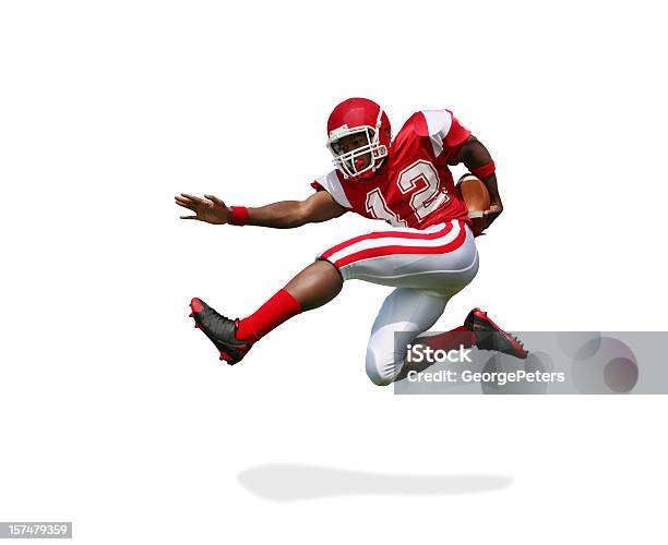 Football Player Running And Jumping With Clipping Path Stock Photo - Download Image Now