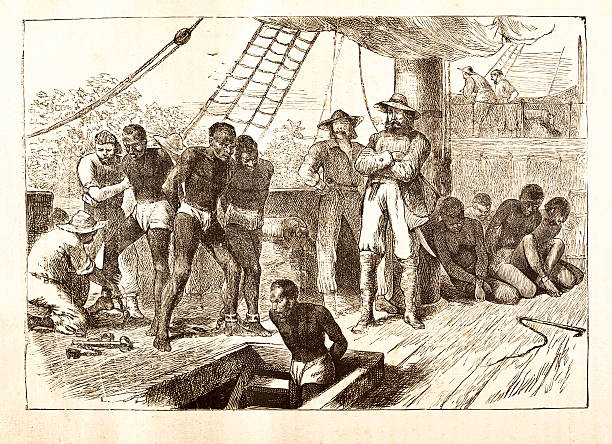 Black slaves loaded on ship 1881 Steel engraving from 1881 with great details africa antique old fashioned engraving stock illustrations