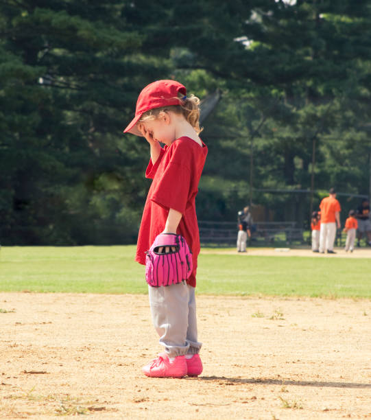 istock Girl in Pink Playing Baseball 157479799