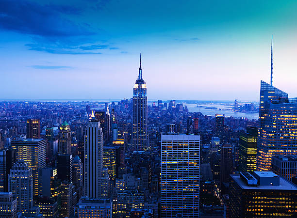 cidade de nova york manhattan skyline ao entardecer - prédio da metlife - fotografias e filmes do acervo