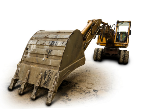 bulldozer with a huge scoop posing on white background