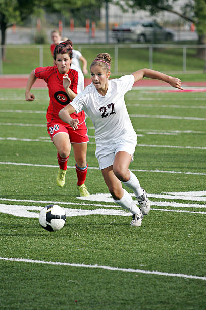 Soccer breakaway and defense.
