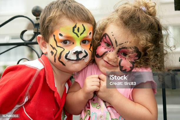 Young Brother And Sister Face Painting Portrait Stock Photo - Download Image Now - Child, Face Paint, Curly Hair