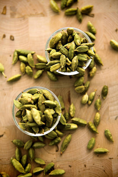 green cardamoms Green cardamoms cardamom stock pictures, royalty-free photos & images