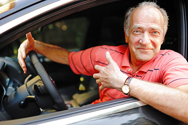 istock Happy Senior Man Driving his car 157480836