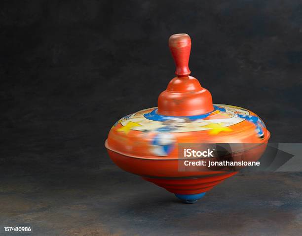 Spinning Childs Toy Top In Motion Stock Photo - Download Image Now - Spinning Top, Toy, Spinning