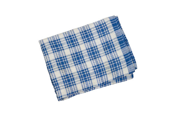 istock blue checkered picnic clothes isolated.Decorative cotton napkin. Plaid gingham towel 1574810349
