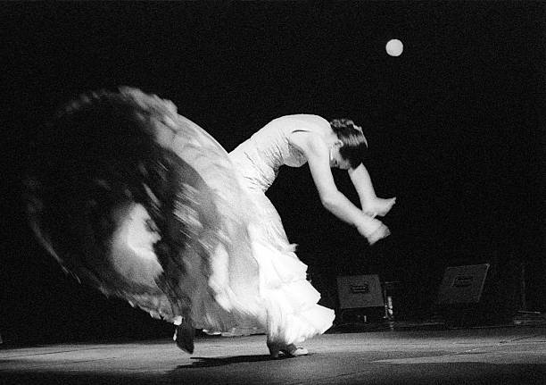 Flamenco dancer in white stock photo
