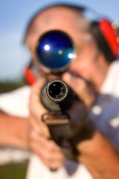 istock Man firing a gun 157481109