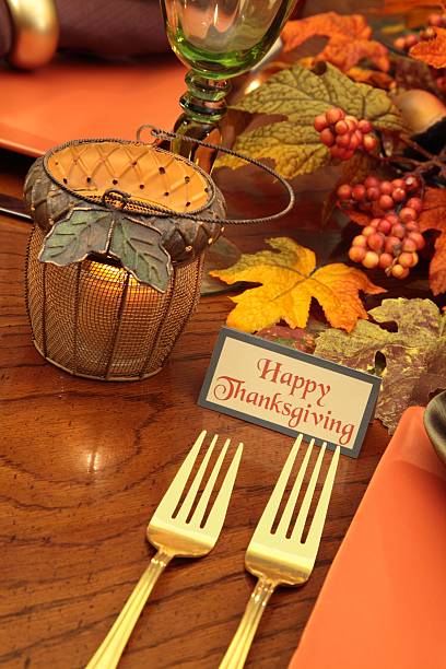 istock Holiday: Thanksgiving Table with forks, fall leaves and candle 157481525