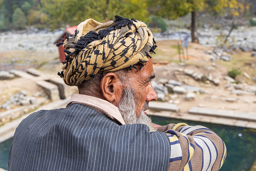 Kangan, Jammu and Kashmir, India. October 27, 2022. Man at the Naranag Temples archaeological site in Jammu and Kashmir.