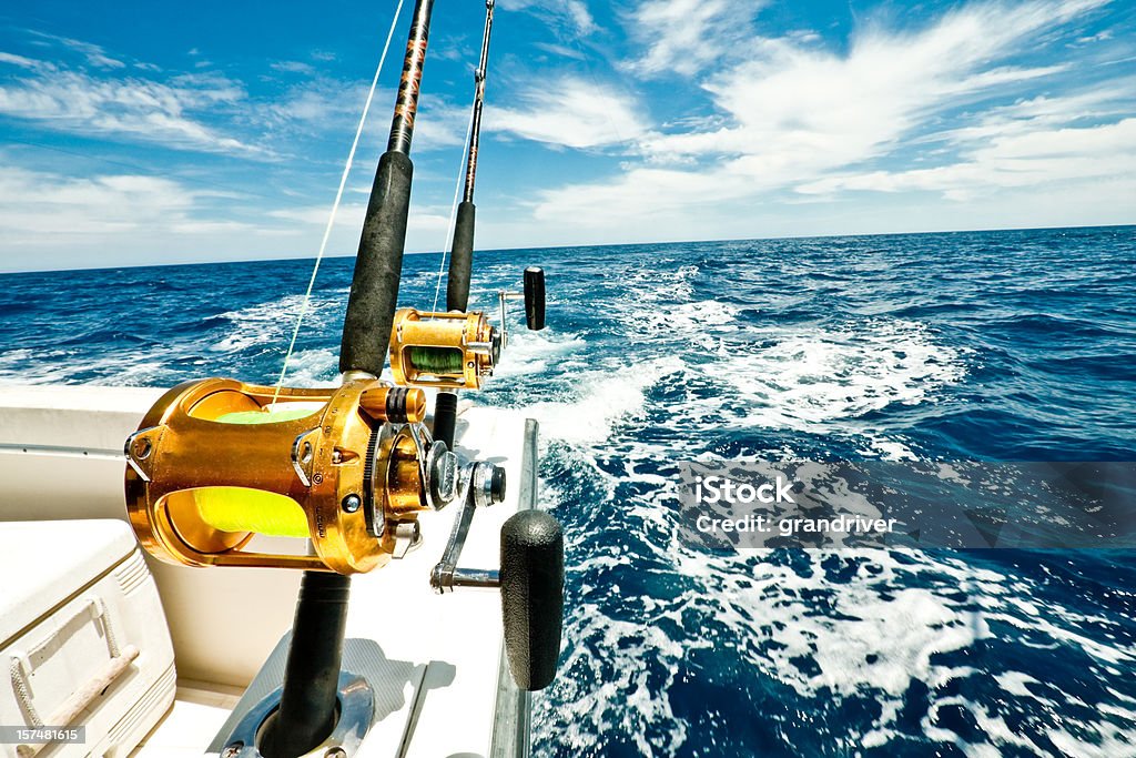 Ocean Fishing Reels On A Boat In The Ocean Stock Photo - Download Image Now  - Fishing, Sea, Nautical Vessel - iStock