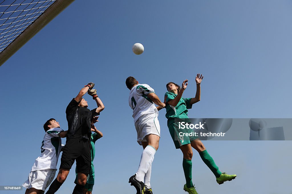 Lotta in mid-air - Foto stock royalty-free di Calcio - Sport