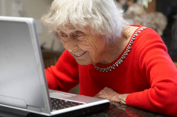 istock Ninety year old lady on laptop 157481696