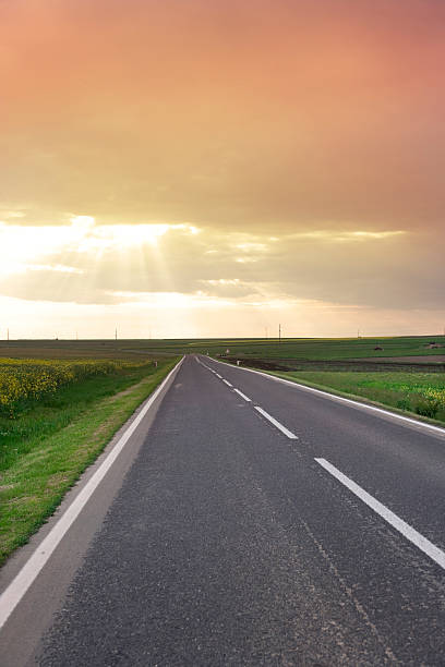 istock Country highway and dramatic evening sky. 157482157