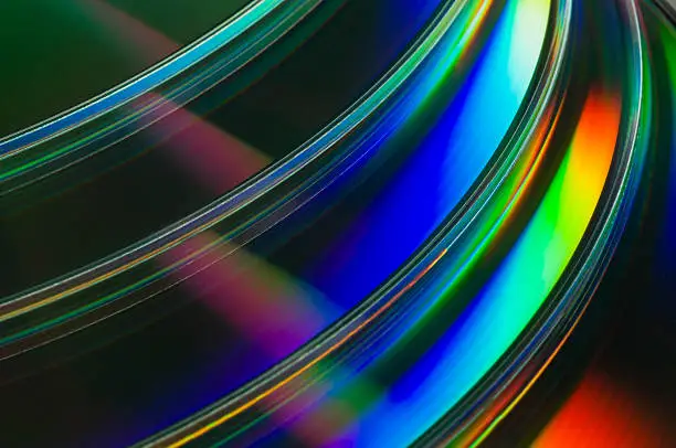 Close up abstract image of compact discs. Space for copy.