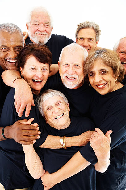 istock Group of senior citizens standing over white 157482388