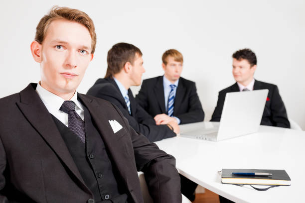 Close up view of professional business team using laptop brainstorming together in meeting room, Officers working in modern office, People with teamwork, Happy working with colleague