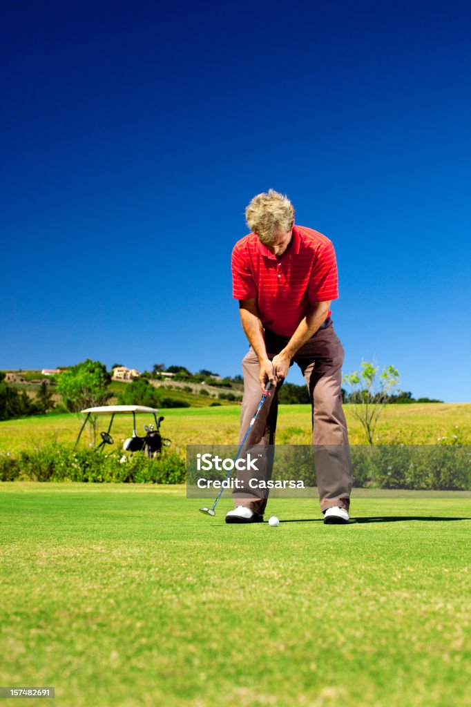 Golfspieler auf dem Grün putting - Lizenzfrei 20-24 Jahre Stock-Foto