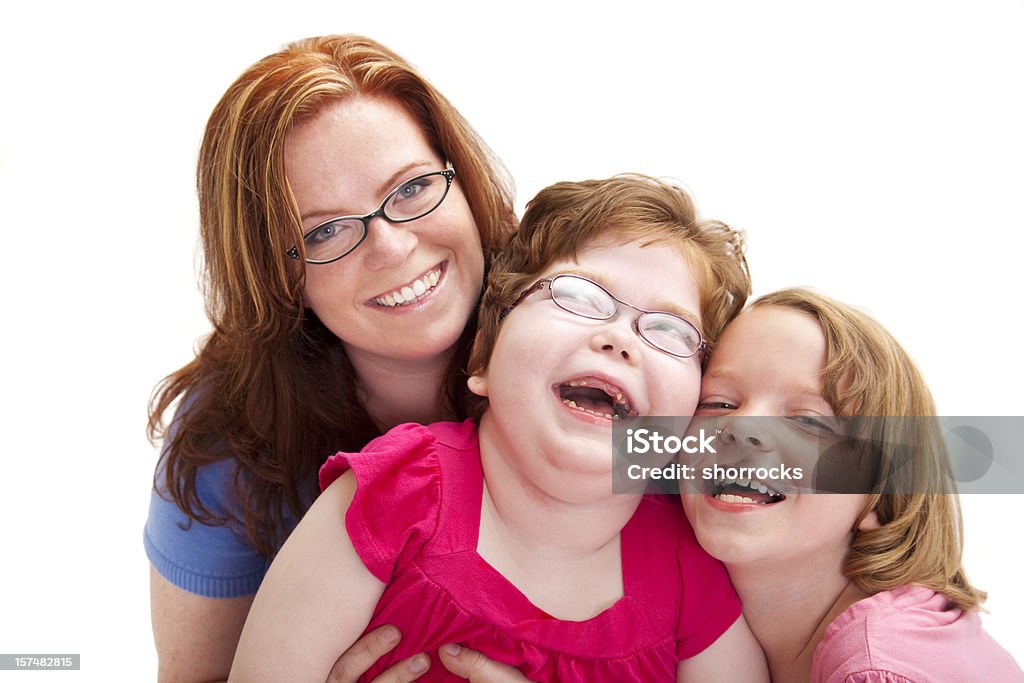 Heureuse mère et deux filles rire - Photo de Fond blanc libre de droits