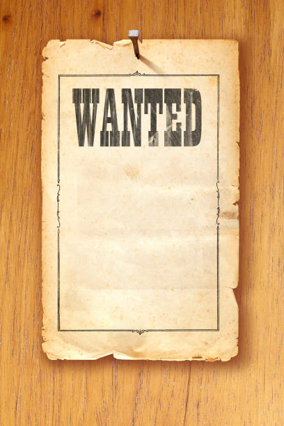 wanted-cartaz em inglês antigo marrom fixo com unhas em fundo de madeira - wanted poster paper wild west burnt - fotografias e filmes do acervo