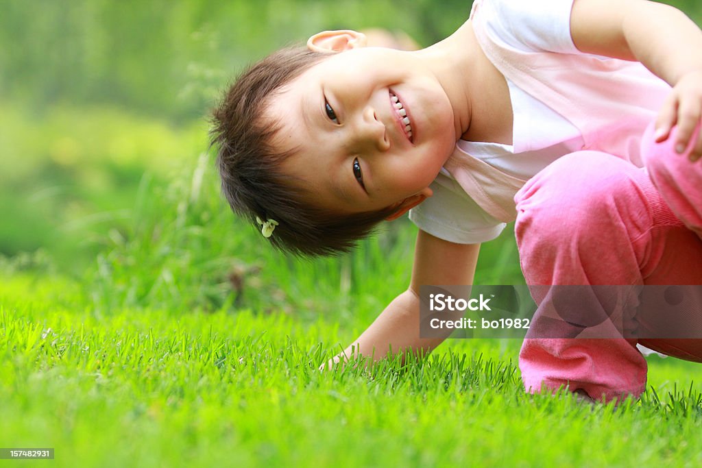 Bella bambina asiatica giocando - Foto stock royalty-free di 18-23 mesi