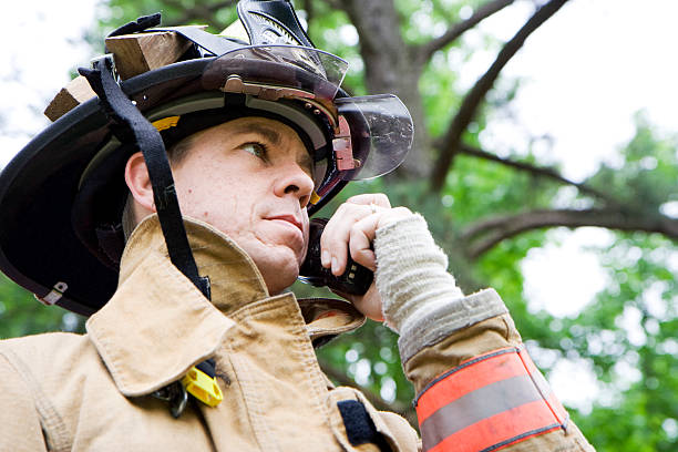 istock Close up of fireman talking on radio 157482999