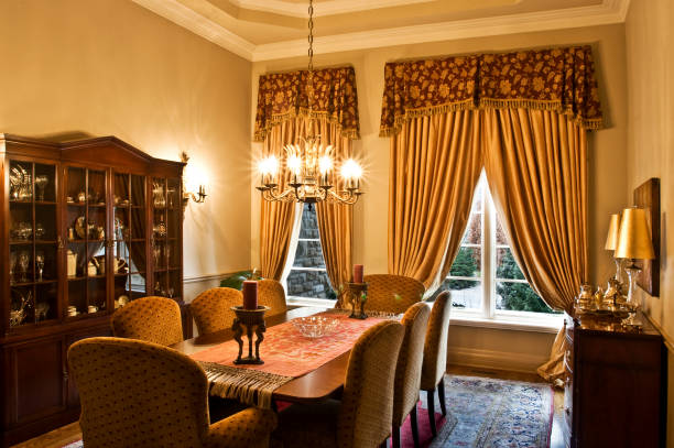 istock Old style dining room with large table and chandelier 157483298