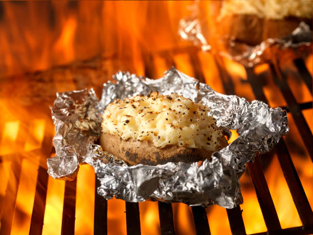 Stuffed Potatoes on the BBQ  baked potato stock pictures, royalty-free photos & images