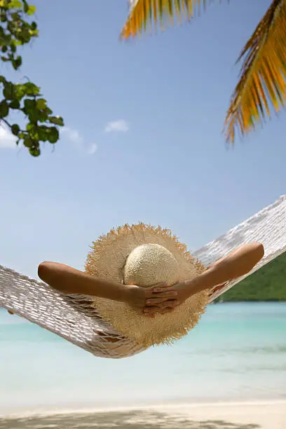 Photo of woman relaxing in hammock