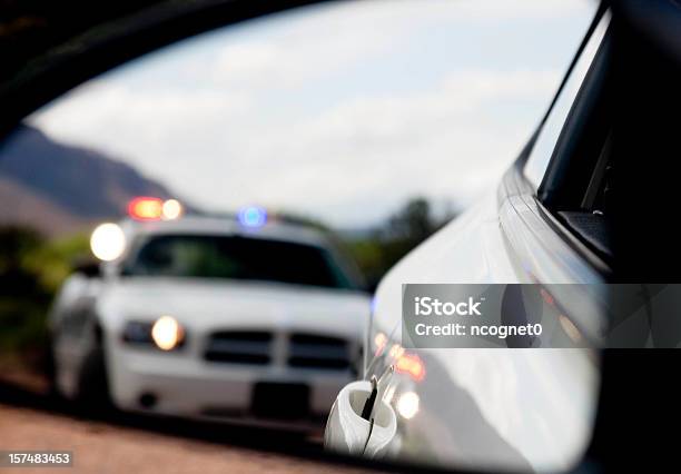 Pulled Over By The Police In Blurred Dodge Charger Stock Photo - Download Image Now - Police Force, Highway Patrol, Speed
