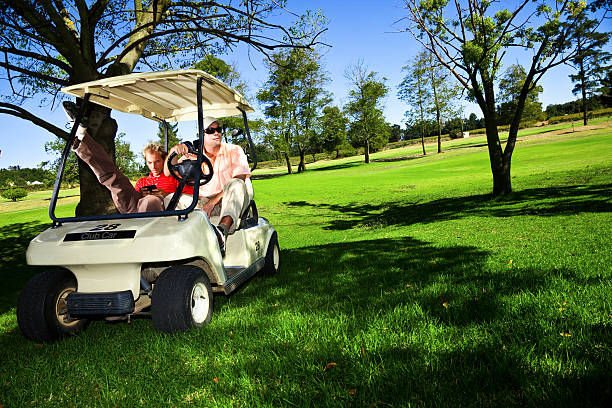 istock Golfers chilling out in the golf cart 157483550