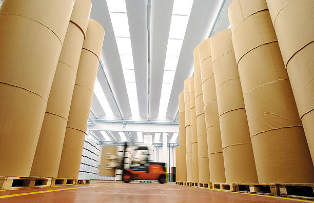 Huge spools of paper in warehouse of a printing company stock photo