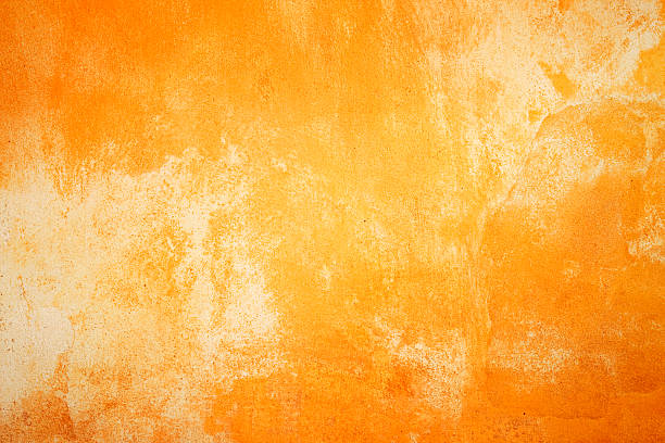 Fiery wall texture Painted wall texture/background in fiery colors. rough stock pictures, royalty-free photos & images