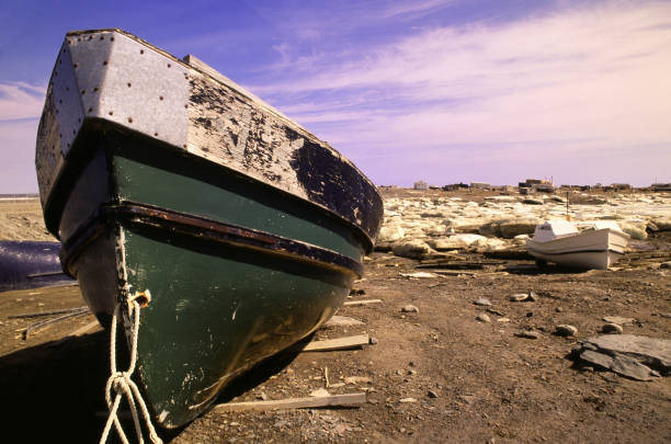 Boat on Shores of Rankin Inlet, Nunavut, Canada stock photo