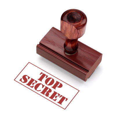 Rubber Stamp with Top Secret. Includes clipping path for stamp.