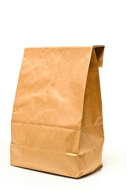 istock Brown Paper Lunch Bag With Shadow 157484516