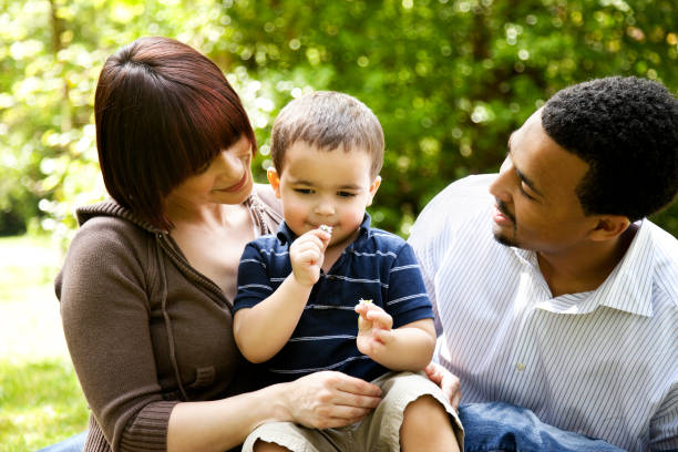 istock Young Family in The Park 157484890