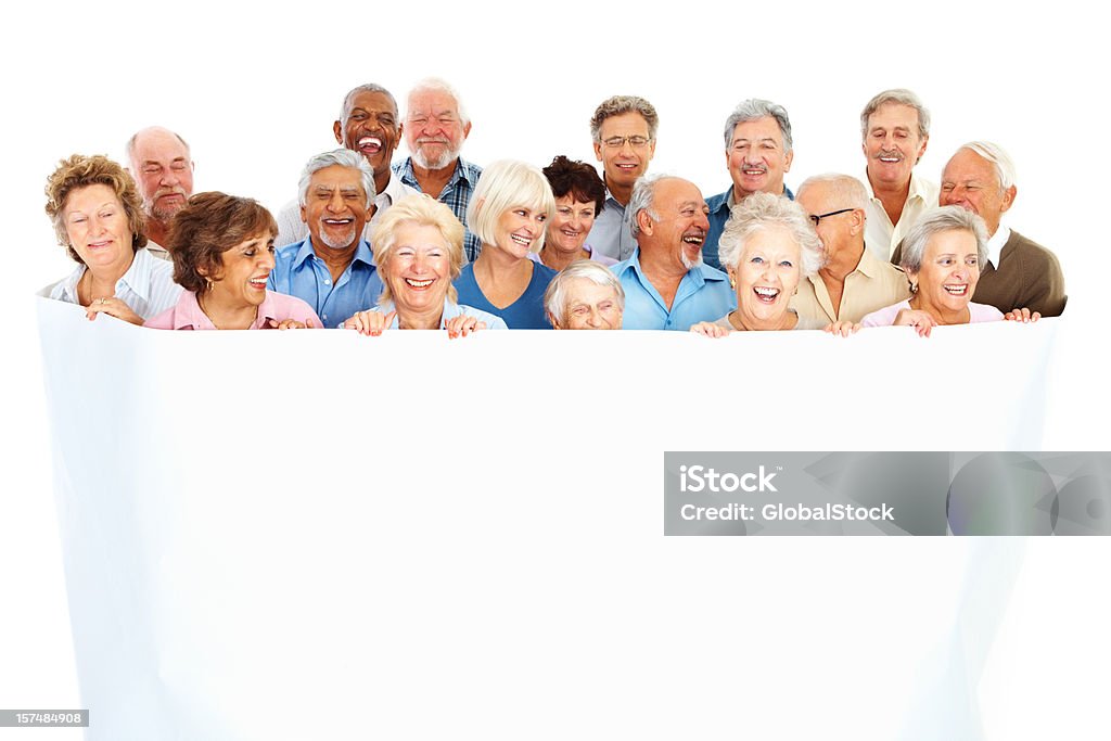 Ältere Menschen, die in einem großen white paper - Lizenzfrei 60-69 Jahre Stock-Foto