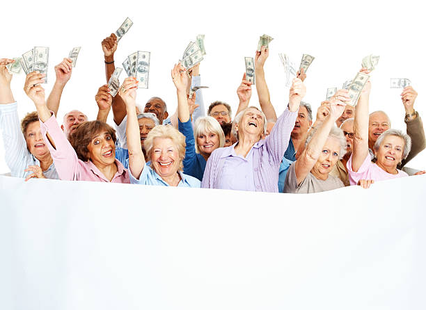 istock Happy senior people holding money with blank placard 157484911