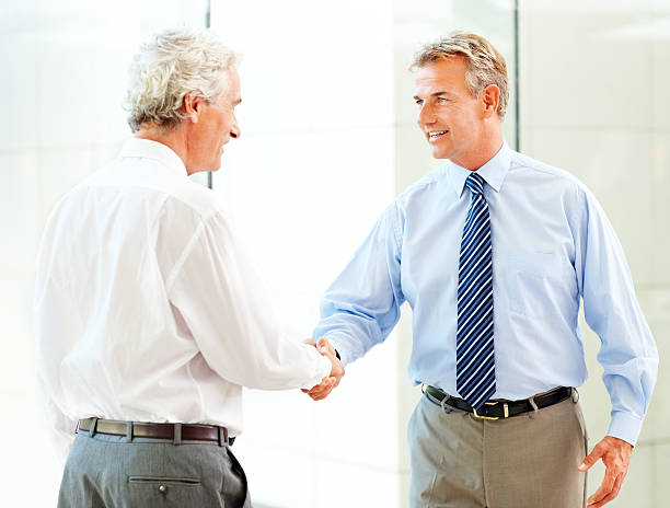 istock Business colleagues shaking hands 157485268